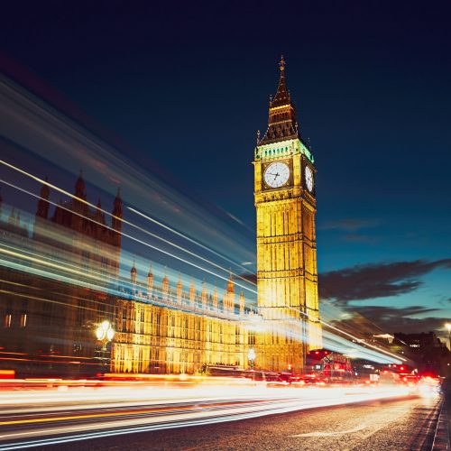 Light trails on the Westminster bridge after sunset. Big Ben and House of Parliament in London, The United Kingdom of Great Britain and Northern Ireland